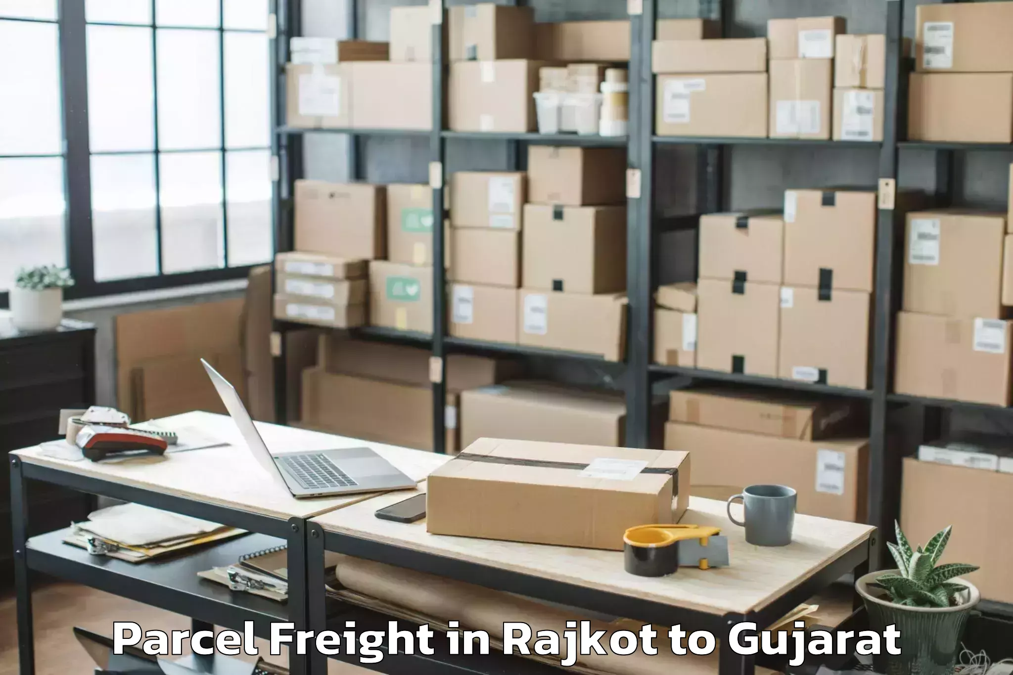 Easy Rajkot to Gls University Ahmedabad Parcel Freight Booking